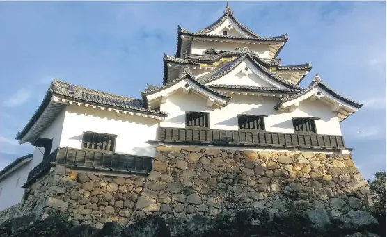  ?? WALK JAPAN ?? The 700-year-old Hikone Castle is among the numerous ancient shrines and prayer temples along the Nakasendo Way.