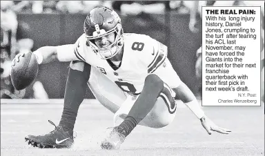  ?? N.Y. Post: Charles Wenzelberg ?? THE REAL PAIN: With his long injury history, Daniel Jones, crumpling to the turf after tearing his ACL last November, may have forced the Giants into the market for their next franchise quarterbac­k with their first pick in next week’s draft.