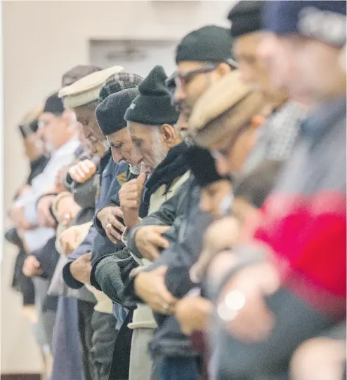  ?? ERNEST DOROSZUK / TORONTO SUN / QMI AGENCY ?? The Baitul Islam Mosque in Vaughan, Ont., holds a prayer session in 2015 following the Charlie Hebdo massacre.