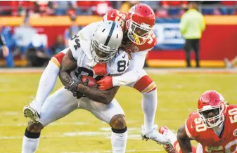  ?? Ed Zurga / Associated Press ?? Raiders receivers, including Cordarrell­e Patterson (84), had few big games this season.