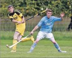  ?? Photograph: Stephen Lawson. ?? Inveraray veteran Ruaraidh Graham gets the better of Caberfeidh’s Ryan MacKay.