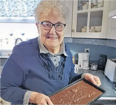  ?? ALISE DEMONT ?? Rae Sawler, 88, says making her mother's fudge recipe is an important Christmas tradition for her family.