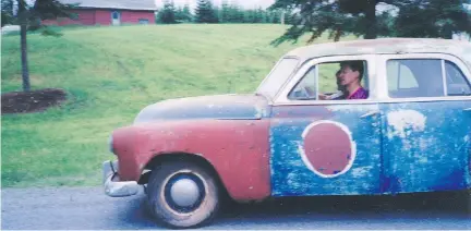  ?? HARRIS BOYD/DRIVING ?? Author Harris Boyd at the wheel of his beloved 1951 Plymouth Cambridge.