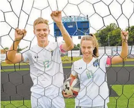  ?? KENNETH K. LAM/BALTIMORE SUN ?? Twins Julian and Sophia Elguera hope to lead their River Hill teams to state titles. Both are fierce competitor­s. The Hawks girls team is seeking its fourth straight state championsh­ip.