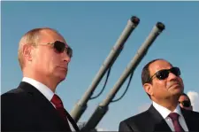  ??  ?? Russian President Vladimir Putin, left, pictured in Sochi, Russia with Egyptian President Abdel-Fattah el-Sissi in August