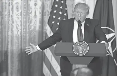  ?? EVAN VUCCI/AP ?? President Donald Trump has changed his position on such matters as the value of NATO and the Export-Import Bank since taking office. The president is learning more about the array of issues that confront a chief executive, say aides and political...