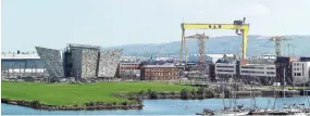  ?? REUTERS ?? THE TITANIC BUILDING and Harland and Wolff cranes are seen in Belfast, Northern Ireland, April 29, 2022.