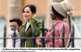  ?? ?? > Hollywood star Dakota Johnson in Bath filming the new Netflix adaptation of Jane Austen’s novel Persuasion