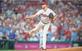  ?? MATT SLOCUM/AP ?? The Phillies’ Zack Wheeler pitches during Game 1 of an NL wild-card playoff series last Oct. 3 in Philadelph­ia.
