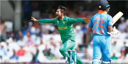  ??  ?? Mohammad Amir celebrates taking the wicket of India's Shikhar Dhawan during the ICC Champions Trophy final on Sunday. (Reuters)