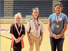  ?? / Contribute­d ?? Above: Gordon County 4-H’er Cheyenne Smith, far left, placed first in the female Cloverleaf Novice division. Below: Gordon County 4-H’er Elijah Turner placed second in the male Cloverleaf Compound division.