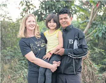  ??  ?? FAMILY AFFAIR: Wor Watthana gym owners Frances and Boom Watthanaya with their daughter.