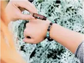  ?? GODDESS GARDEN ?? The porous lava rock on the Goddess Garden aromathera­py bracelets helps the Goddess Garden essential-oil blends go where you go.