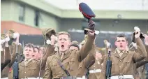  ??  ?? > Soldiers from The Royal Welsh Regiment on parade