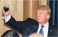  ?? Picture: Getty. ?? Donald Trump raises a toast at a dinner hosted by Japanese Prime Minister Shinzo Abe.