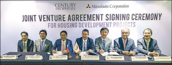  ??  ?? In photo during the joint venture agreement signing are (from left): Century Properties Group officials Jose Carlo Antonio, chief finance officer; Marco Antonio, chief operating officer; and Jose E.B. Antonio, chairman and CEO with Mitsubishi Corp....