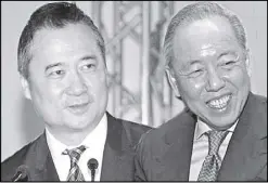  ??  ?? Taxing times: Henry Sy Jr. with partner Roberto Coyiuto Jr.