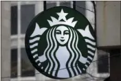  ??  ?? This March 14, 2017, file photo show the Starbucks logo on a shop in downtown Pittsburgh. Starbucks said Saturday it has told workers to consider anyone who walks into its stores a customer, “regardless of whether they make a purchase.” AP PHOTO/GENE...