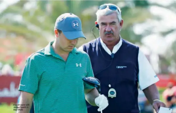  ??  ?? A quiet word with Jordan Spieth in Abu Dhabi.