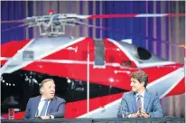  ?? REUTERS ?? Prime Minister Justin Trudeau, right, and Quebec Premier Francois Legault take part in a news conference in Montreal on Thursday.