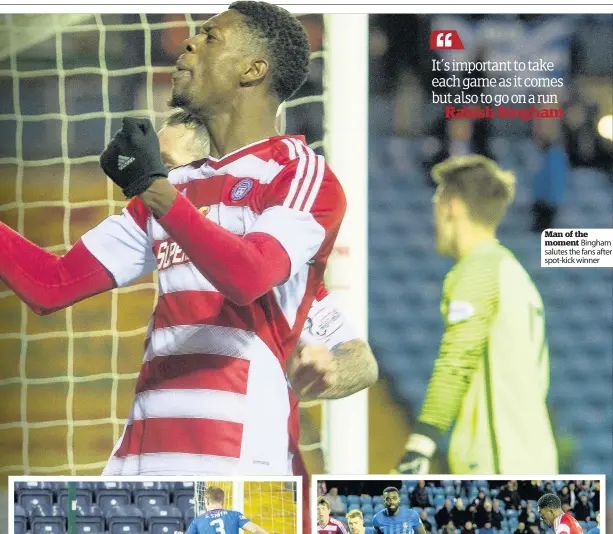  ??  ?? Man of the moment Bingham salutes the fans after spot-kick winner