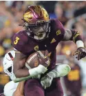  ?? JOE CAMPOREALE/USA TODAY SPORTS ?? ASU running back Rachaad White shares the Pac-12 lead in rushing touchowns with 14. He has run for 869 yards on 146 carries.