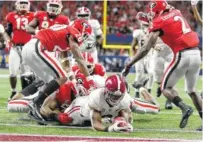  ?? ALABAMA PHOTO/KENT GIDLEY ?? The Georgia Bulldogs are working to regroup before their Sugar Bowl matchup against Texas after losing last Saturday’s Southeaste­rn Conference championsh­ip game 35-28 to Alabama, a contest the Bulldogs led 28-14.