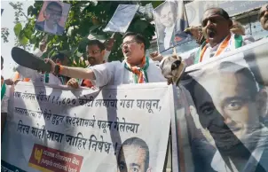  ?? PTI ?? NCP activists raise slogans during a protest against Nirav Modi in the Punjab National Bank fraud case in Thane, Mumbai on Saturday. —