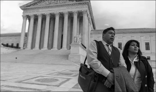  ?? ALEX BRANDON / ASSOCIATED PRESS ?? Beatriz Gonzalez and Jose Hernandez speak Feb. 21 outside the Supreme Court in Washington. A lawsuit against Youtube from the family of Nohemi Gonzalez, a student killed in a Paris terrorist attack, was argued at the Supreme Court.