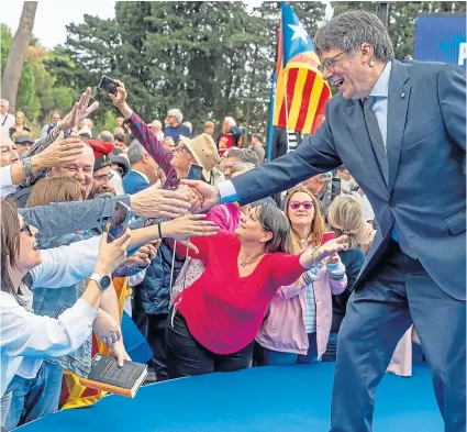  ?? ?? Puigdemont faces arrest on charges of disobedien­ce and misuse of public funds should he return.