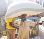  ?? ?? One of the trucking loading in one of the markets in Katsina