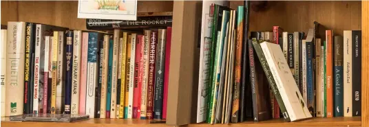  ??  ?? Fischman’s translatio­ns, more than 200 in total, are stacked two deep and fill nearly two metres of shelf space. “And there are others in press,” she says.