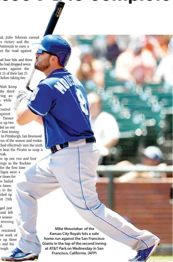  ??  ?? Mike Moustakas of the Kansas City Royals hits a solo home run against the San Francisco Giants in the top of the second inning at AT&T Park on Wednesday in San Francisco, California. (AFP)