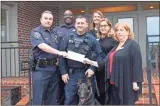  ?? Kelcey Caulder ?? From left: Calhoun Police Chief Tony Pyle, Capt. Ken Carson, Officer Jeremy Thompson, chamber Director of Membership Kim Gallman, chamber President and CEO Kathy Johnson, and Drugs Don’t Work Committee Chair Debbie Vance. The dog is Logan.
