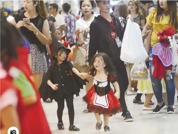  ?? Photo by Amper Campaña ?? HALLOWEEN. Children attend a halloween event in a mall dressed in their favorite fairy tale characters. Observed in many countries, Halloween marks the start of a celebratio­n that is dedicated to rememberin­g the dead.