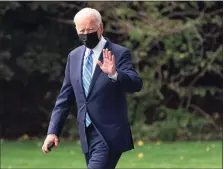  ?? Associated Press ?? President Joe Biden walks to board Marine One for a trip to Illinois to talk about vaccine requiremen­ts on Thursday.