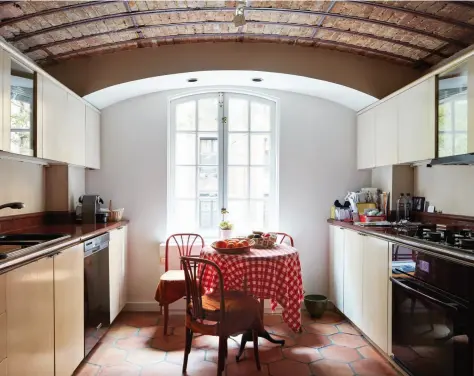  ??  ?? The Kitchen
Like the living room, it has a vaulted ceiling and south-facing windows.