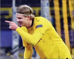  ?? BERND THISSEN — POOL VIA AP ?? Dortmund’s Erling Haaland celebrates after scoring in Tuesday’s Champions League match against Sevilla FC.