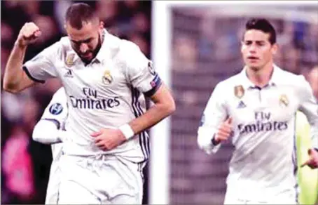  ??  ?? Real Madrid’s duo of Karim Benzema (left) and James Rodriguez celebratin­g the 3-1 victory over Napoli in the UEFA Champions League clash at the Santiagos Bernabeu…last night