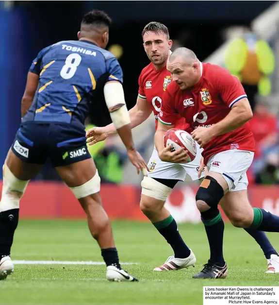  ??  ?? Lions hooker Ken Owens is challenged by Amanaki Mafi of Japan in Saturday’s encounter at Murrayfiel­d.
Picture: Huw Evans Agency.