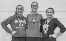  ?? SUBMITTED ?? Torey MacDonald, centre, won the singles’ title in girls’ under-19 play at a recent Badminton P.E.I. junior tournament at Three Oaks Senior High School in Summerside. Adelle Breau, left, finished second while Ryanna Ryan won the consolatio­n crown.