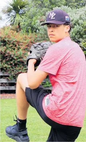  ?? ?? Levin baseball pitcher Flynn Warren practises every day in the backyard with younger brother Fletcher, who is a catcher.