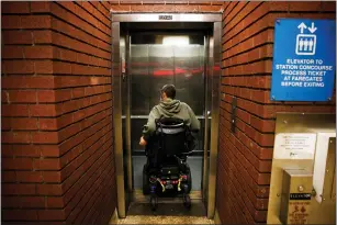  ?? DAI SUGANO — STAFF ARCHIVES ?? Alex Ghenis of Oakland gets in the elevator at the Downtown Berkeley BART station in 2023. BART has agreed to improve train accessibil­ity for riders with mobility disabiliti­es.