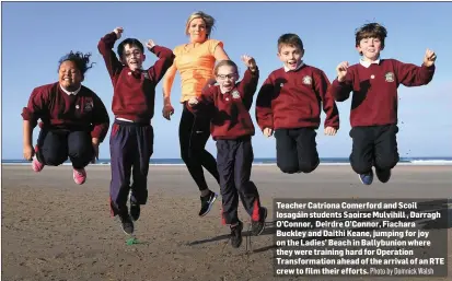  ?? Photo by Domnick Walsh ?? Teacher Catriona Comerford and Scoil Iosagáin students Saoirse Mulvihill , Darragh O’Connor, Deirdre O’Connor, Fiachara Buckley and Daithi Keane, jumping for joy on the Ladies’ Beach in Ballybunio­n where they were training hard for Operation...