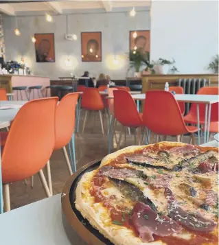  ??  ?? Above, the Proven People open pizza bar means you can see your pies being made while you wait. Top, there's also a well presented outdoor area for customers to enjoy the wide ranging choice of food and drinks on offer.