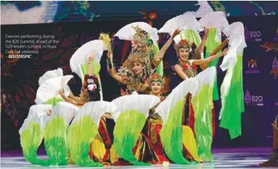  ?? REUTERSPIC ?? Dancers performing during the B20 Summit, ahead of the G20 leaders summit, in Nusa Dua, Bali yesterday.
–