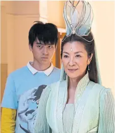  ?? DISNEY PLUS TRIBUNE NEWS SERVICE ?? Jim Liu, left, and Michelle Yeoh costar in the new comedy series "American Born Chinese," which premieres Wednesday on Disney Plus.