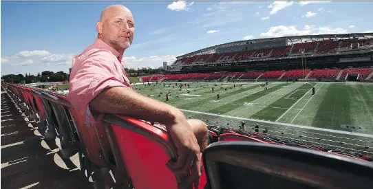  ?? SEAN KILPATRICK/THE CANADIAN PRESS ?? Former CFL receiver Ken Evraire, seen at TD Place in Ottawa on Wednesday, says he will donate his brain to science. Busy today as a broadcaste­r who covers the Ottawa Redblacks, Evraire says he suffered at least two concussion­s. “There’s many athletes,...