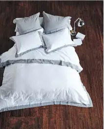  ??  ?? Gone are the days of complicate­d beds with layer upon layer of accessorie­s. In most cases, something more streamline­d is wanted these days and buyers are advised to start with good pillows, a decent duvet, and sheets of 100 per cent Egyptian cotton.