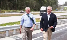  ?? Photograph: Jason O’Brien/AAP ?? Australian prime minister Scott Morrison (right) with deputy PM Michael McCormack. The Coalition’s infrastruc­ture investment­s in the 2021 federal budget are designed to help lay the groundwork for an election contest either later this year or early next year.